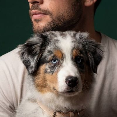 The model and dog are taken strictly from the reference photo. The model's face 