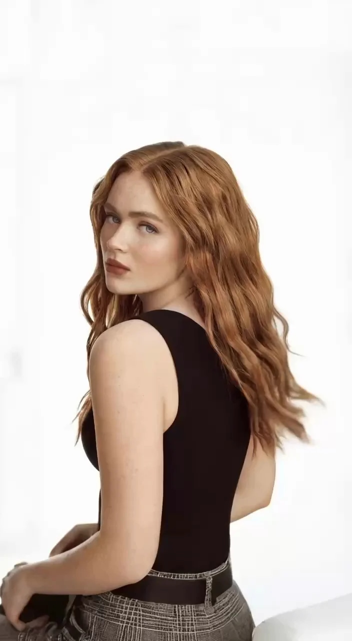 The camera is completely static, eye-level, medium close-up. No camera